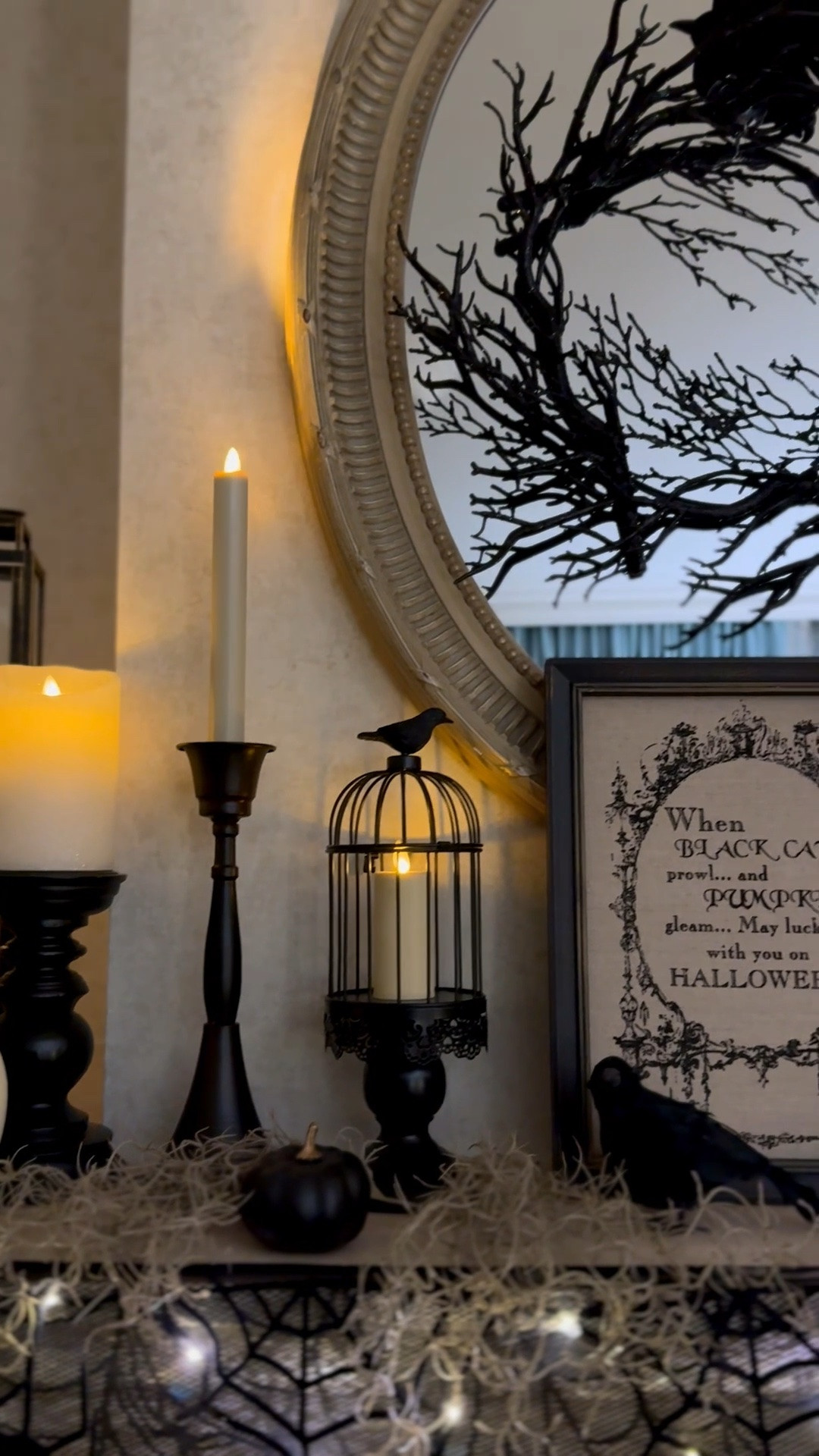 Spooky chic Halloween decor, Halloween living room mantel, decorative crows, black candles

#LTKHome #LTKSeasonal #LTKSaleAlert