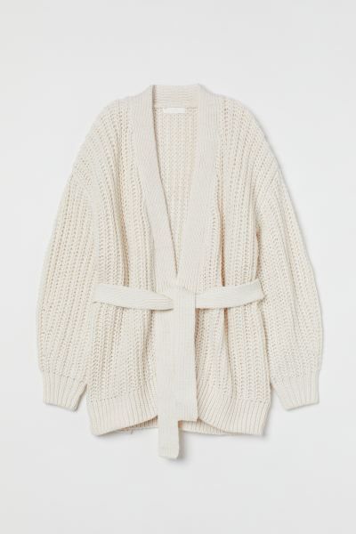 Conscious choice  Soft, rib-knit cardigan with wool content. Dropped shoulders, long sleeves, and... | H&M (US + CA)