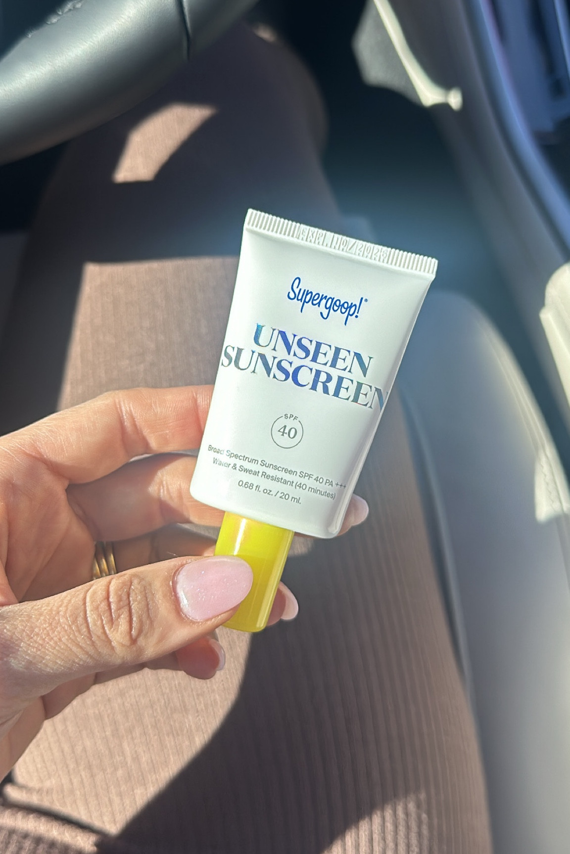 this sunscreen is so invisible it’s unreal!!!! clear, no white cast, no oily or sticky feeling — truly amazed! ladies if you have trouble getting your man to put sunscreen on def try this one! I got it for my car to put on my hands while driving!