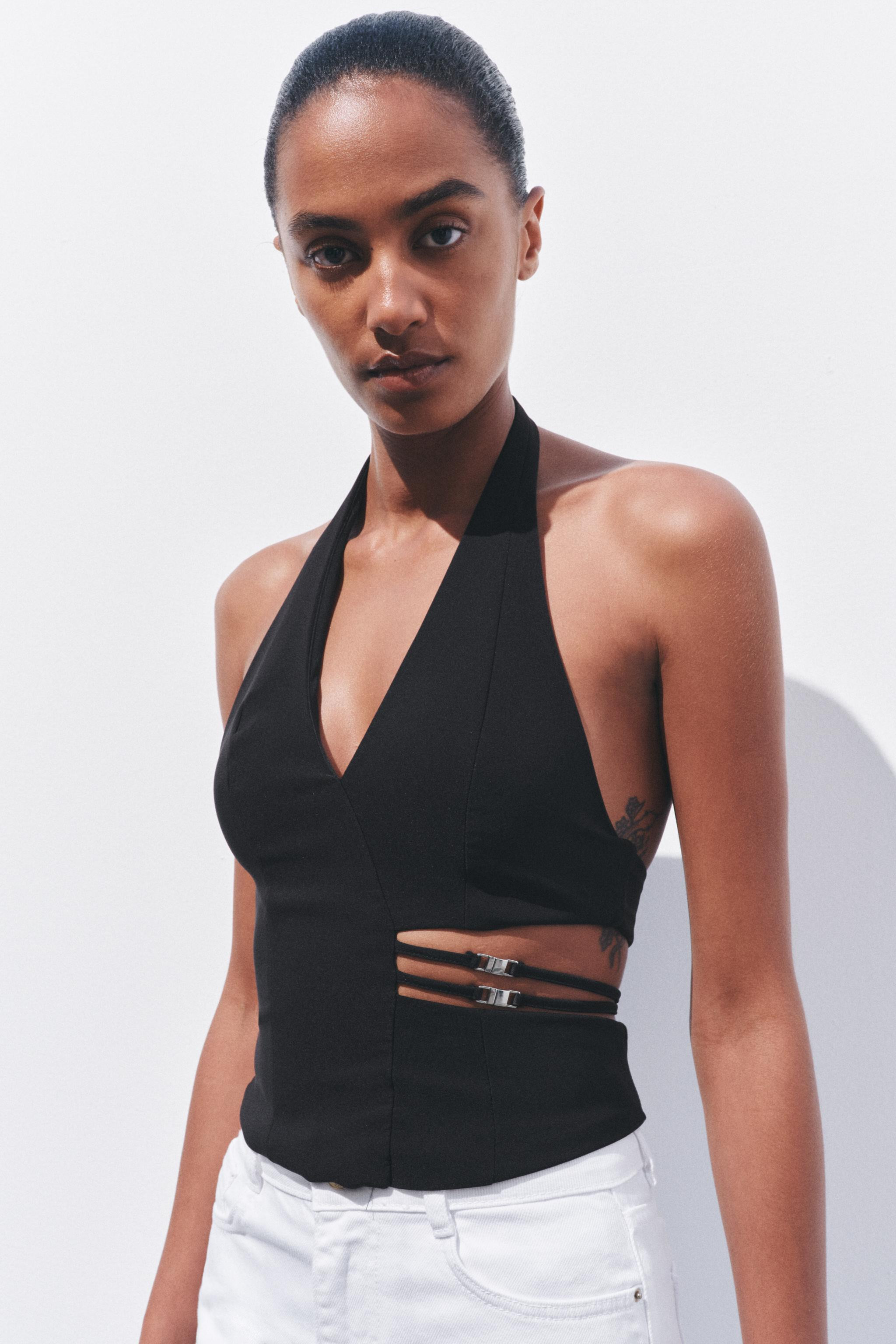 Halter top with a v-neck and open back. Cutout detail at the waist with thin straps and metallic ... | Zara US