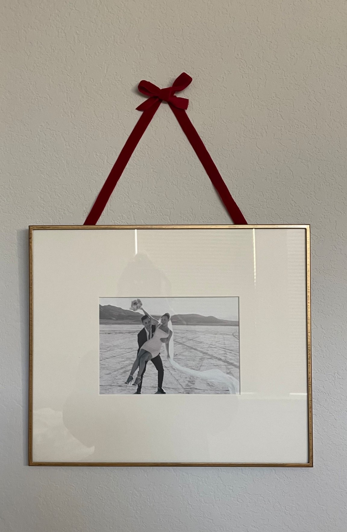 Love adding red ribbon to pictures throughout my house for Christmas! #christmasdecor #christmashomedecor #diychristmasdecor 

#LTKHoliday #LTKFindsUnder50 #LTKHome