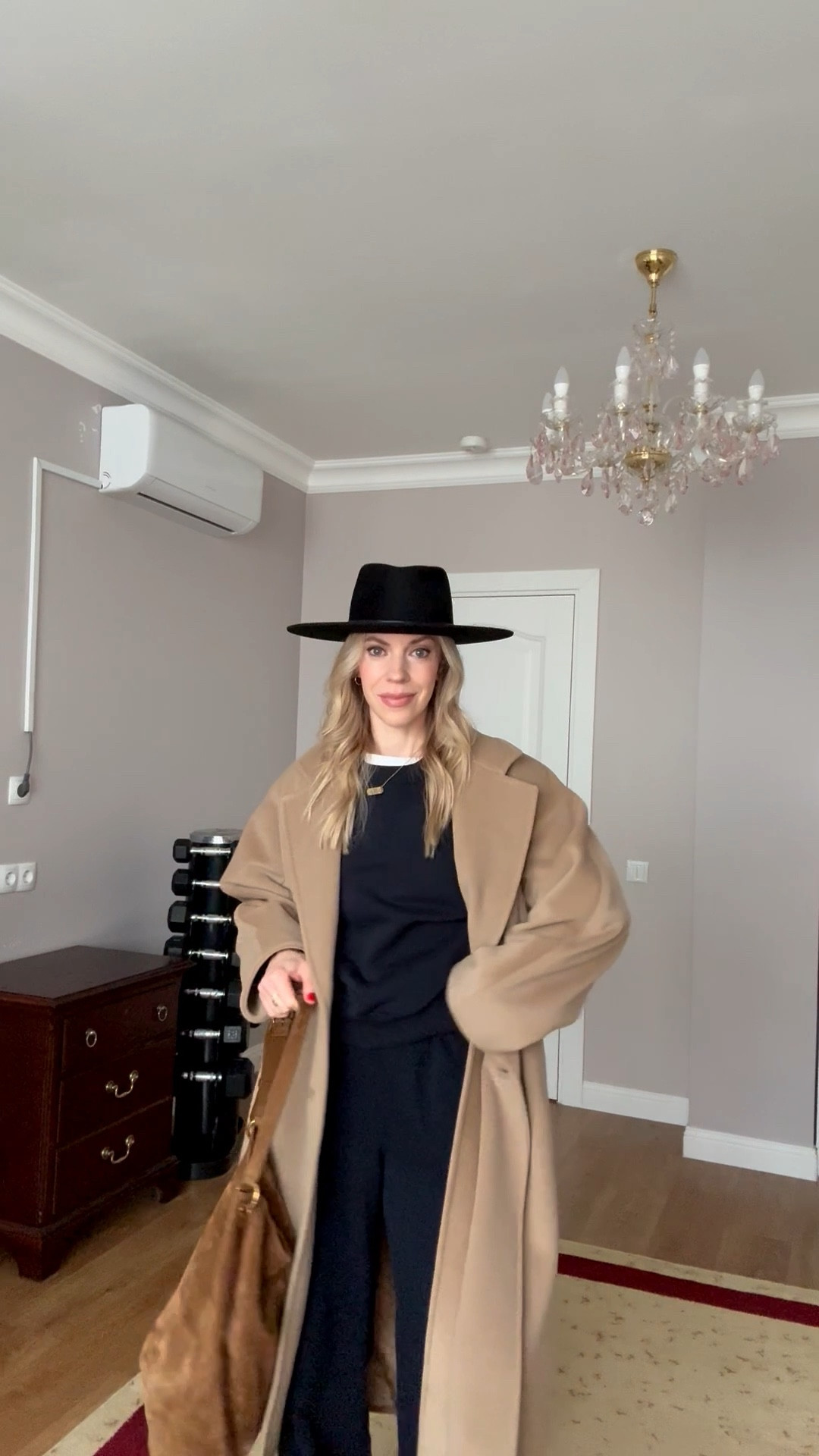 Chic travel look, travel style, camel coat, airport outfit, @Janessa Leone black wool hat, @Zara sweatsuit, suede YSL bucket bag

#LTKOver40 #LTKTravel #LTKSeasonal