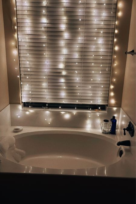 Relaxing bath tub bath pillow curtain lights bubble bath master bathroom 

#LTKsalealert #LTKhome #LTKfindsunder50