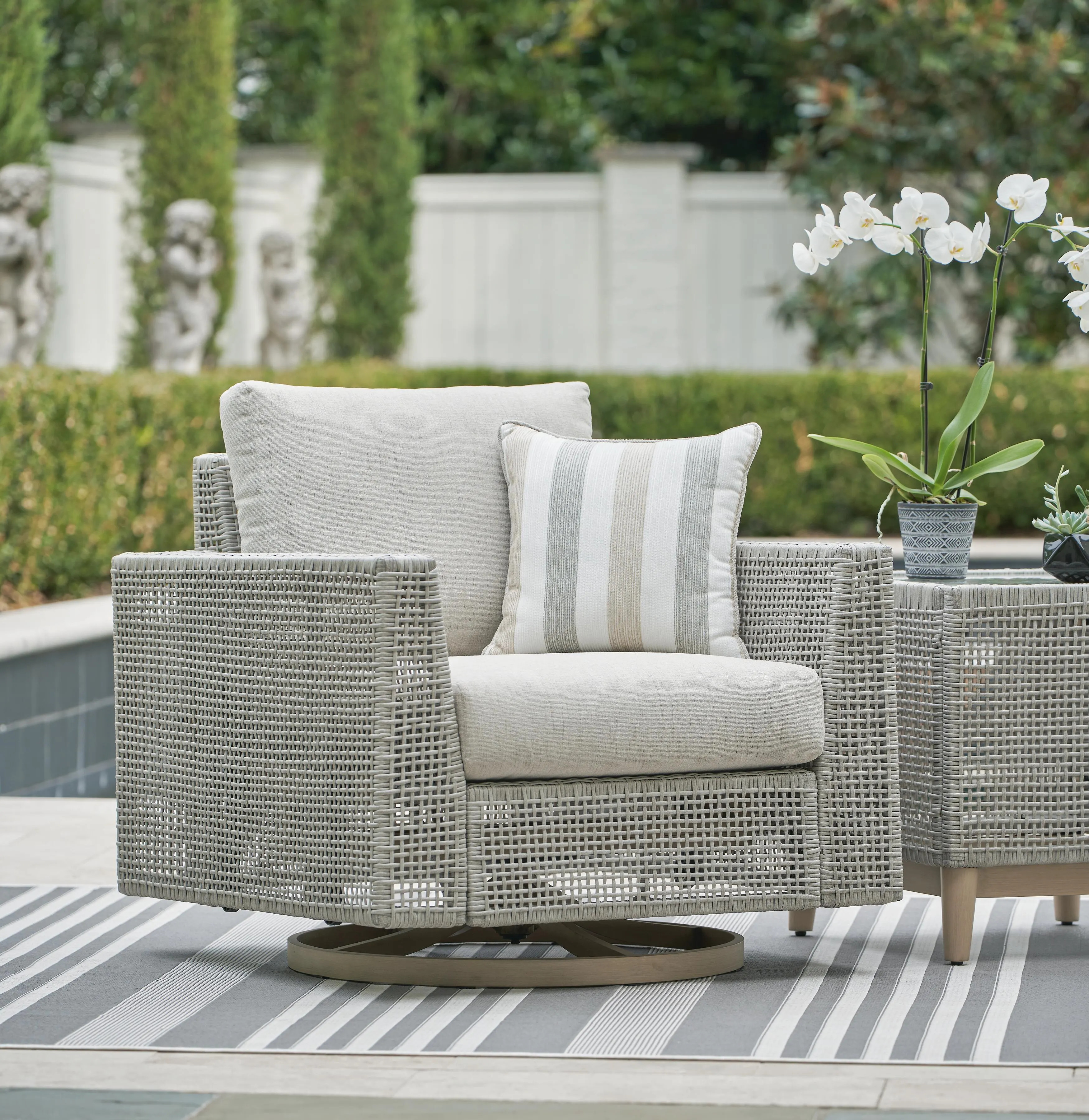 Seton Creek Outdoor Swivel Lounge Chair | Ashley | Ashley