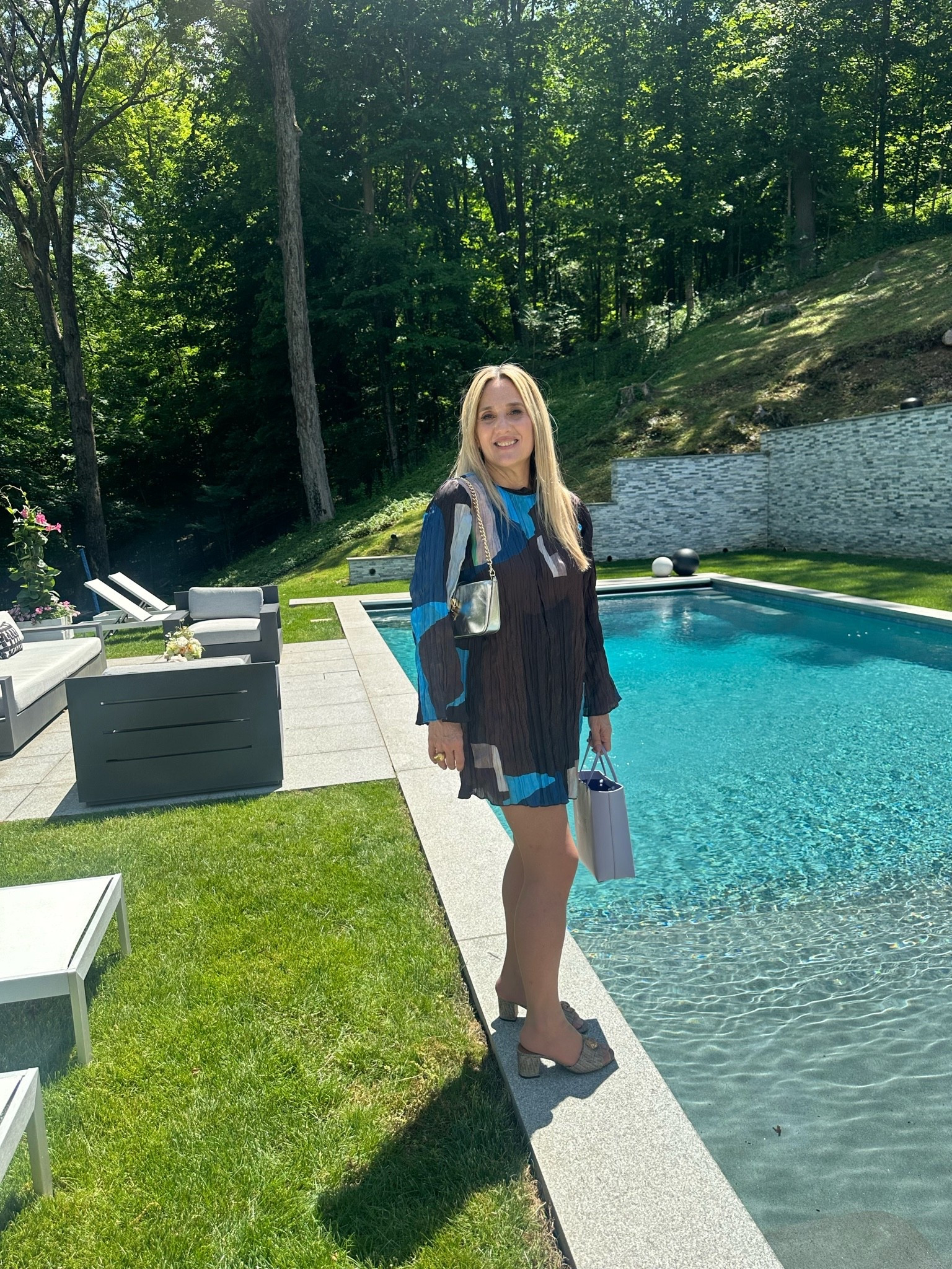 I usually like being behind the camera but I was asked to speak to a group of ladies, in Greenwich, at a beautiful luncheon. We talked about luxury fashion, of course. I picked out this Staud dress in advance, I love the geometric pattern and the comfortable fabric. I did have to shorten the sleeves on a basic medium, so keep that in mind.