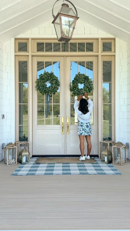 #ad My front porch was in dire need of a makeover.  I used my leaf blower and cobweb brush from @walmart to clean up the space. Then updated the rug to this $85 light blue buffalo check one that I’ve been eyeing forever. I love how it turned out! #walmartpartner #walmarthome 

#LTKVideo #LTKHome #LTKSeasonal