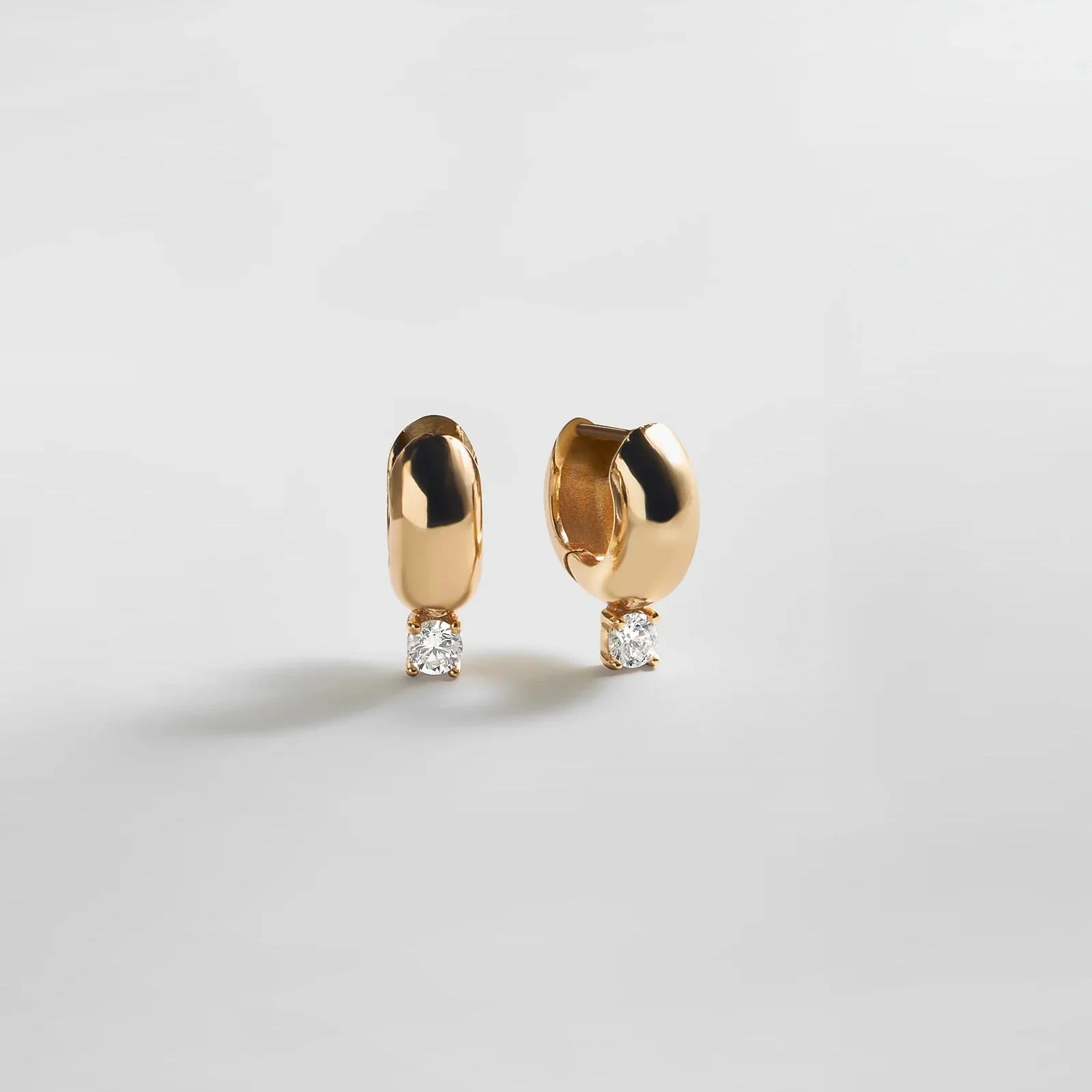 Kourtney Huggie Earrings - Kourtney Gold Plated Brass Earrings | BaubleBar