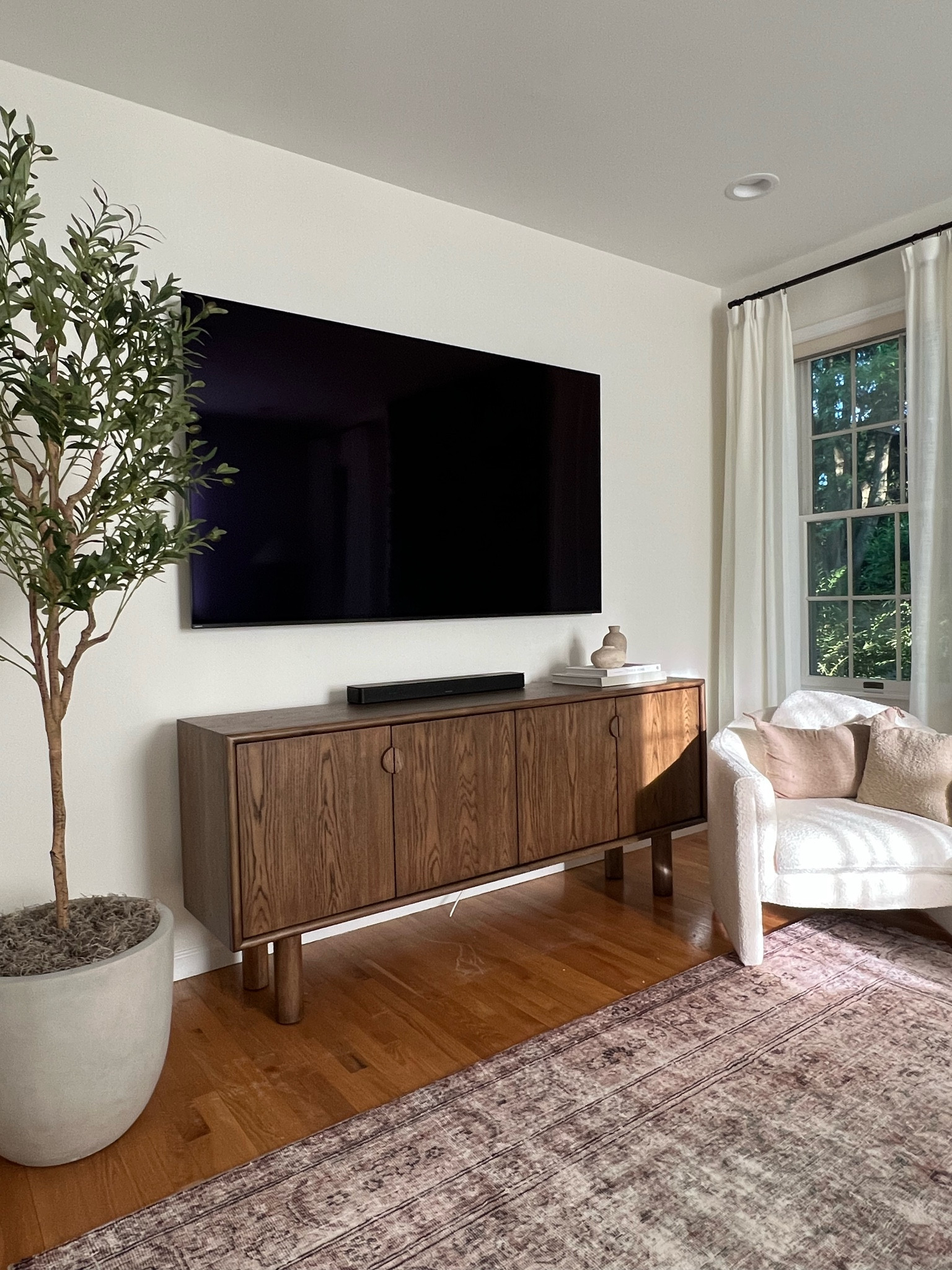 Dark wood console table. Has slots in the back to hide plugs, too! Highly recommend. For half price off the console search  “felix toasted natural oak” from Living Spaces (Not on LTK!!) 

Home decor, neutral decor, organic modern decor, neutral home decor, earthy decor, console table, media cabinet, sideboard, neutral sideboard

#LTKhome #LTKFind