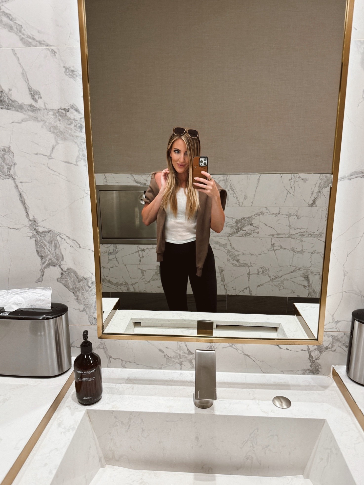 Delta Sky Club Monday energy. Wearing my favorite Hanes boys tank in a medium 8-10 (if you know, you know), Alo crewneck in a medium around my shoulders, Vuori leggings in small, Lululemon sports bra underneath, plus the Nikes everyone’s chasing for fall. I’m a creature of habit when it comes to airport outfits, comfy, layered, & easy to move in but still pulled together. 

airport travel outfit - comfy airport outfit idea - alo oversized crewneck - vuori daily legging - lululemon align bra - hanes boys tank top - fall travel outfit - airport athleisure style - nike fall sneakers - airport outfit leggings - delta sky club lounge - cute airport outfit - travel day essentials - fall nike outfit - layering outfit for flights - what to wear on a plane - fall layering travel style - airport outfit women fall

#LTKU #LTKActive #LTKTravel