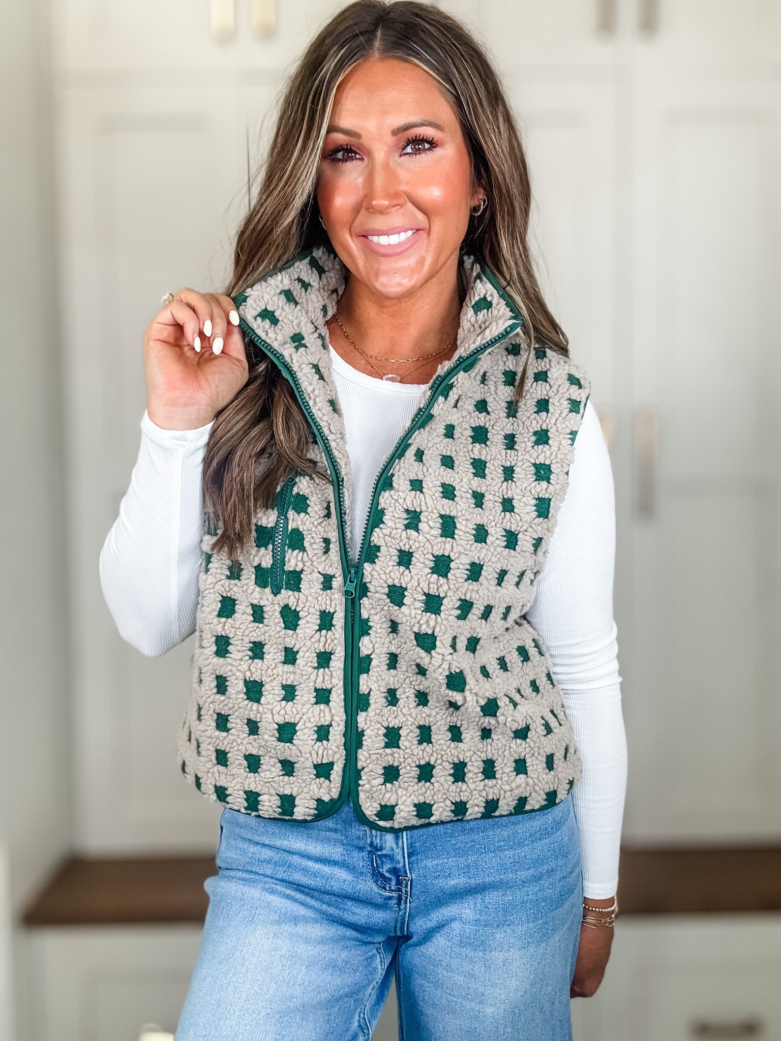 Cozy, Cute & Checkered This Vest Is a Whole Fall Mood!

Okayyy how fun is this checkered sherpa vest?! It’s giving cozy crochet vibes meets Pinterest girl fall 🍂 I’m 36 and a mom of girls, so I’m always on the hunt for pieces that are cute and versatile—and this one checks both boxes 💚 The zip-up makes it easy for layering, and it’s the kind of throw-on-and-go piece you’ll reach for constantly. Whether I’m headed to the school pickup line, fall festivals, or just grabbing coffee—this sherpa vest adds a little personality to any outfit. Want the link? Drop a “🍁” in the comments and I’ll tag you in the shoppable video!

	•	checkered sherpa vest
	•	crochet fleece jacket
	•	fall layering vest


#FallLayering #TikTokShopFinds #CozyStyle #CheckeredTrend #SherpaSeason #MomStyleInspo #CrochetVibes #CuteAndComfy #FallOOTD 

#LTKSeasonal #LTKautumn #LTKStyleTip