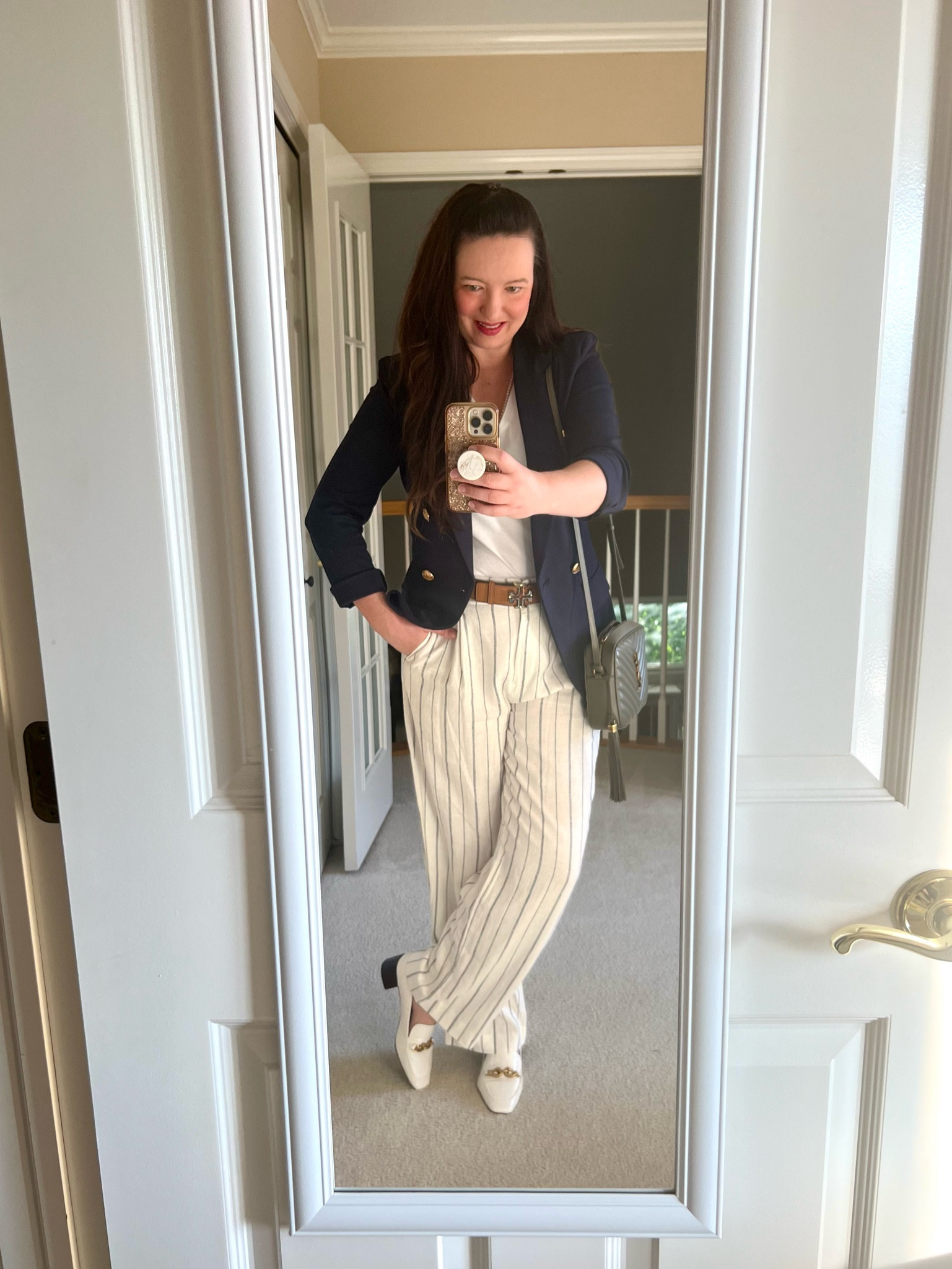 Yes, white can be worn after Labor Day!  This is a fun summer to fall transitional look: cream linen wide leg trouser pants with navy blue stripes, a navy blue blazer, and cream loafers.  Perfect outfit for work!  Paired it with my YSL Lou Camera Bag (in color Gray Khaki - sold out but similar color, Storm Gray, is linked)

#LTKSeasonal #LTKStyleTip #LTKWorkwear