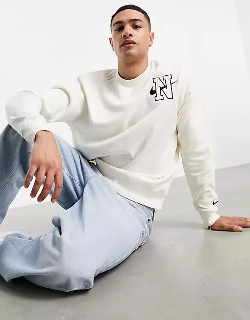 Nike Retro logo fleece sweatshirt in cream | ASOS (Global)
