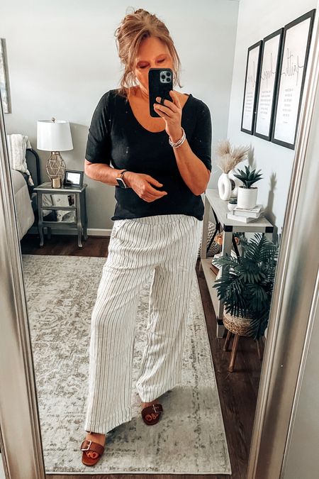 Striped linen pants from Walmart fits tts, more colors. Styled with black tee with ballet back ( reversible) and Time and tru sandals. Pants under $20, outfit under $50

Casual outfit, spring outfit, wide leg pants, linen pants, Walmart fashion, Walmart finds, business casual, workwear, everyday outfit, fashion over 40, sale

#LTKsalealert #LTKstyletip #LTKfindsunder50