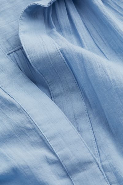 Katoenen blouse met V-hals | H&M (DE, AT, CH, NL, FI)