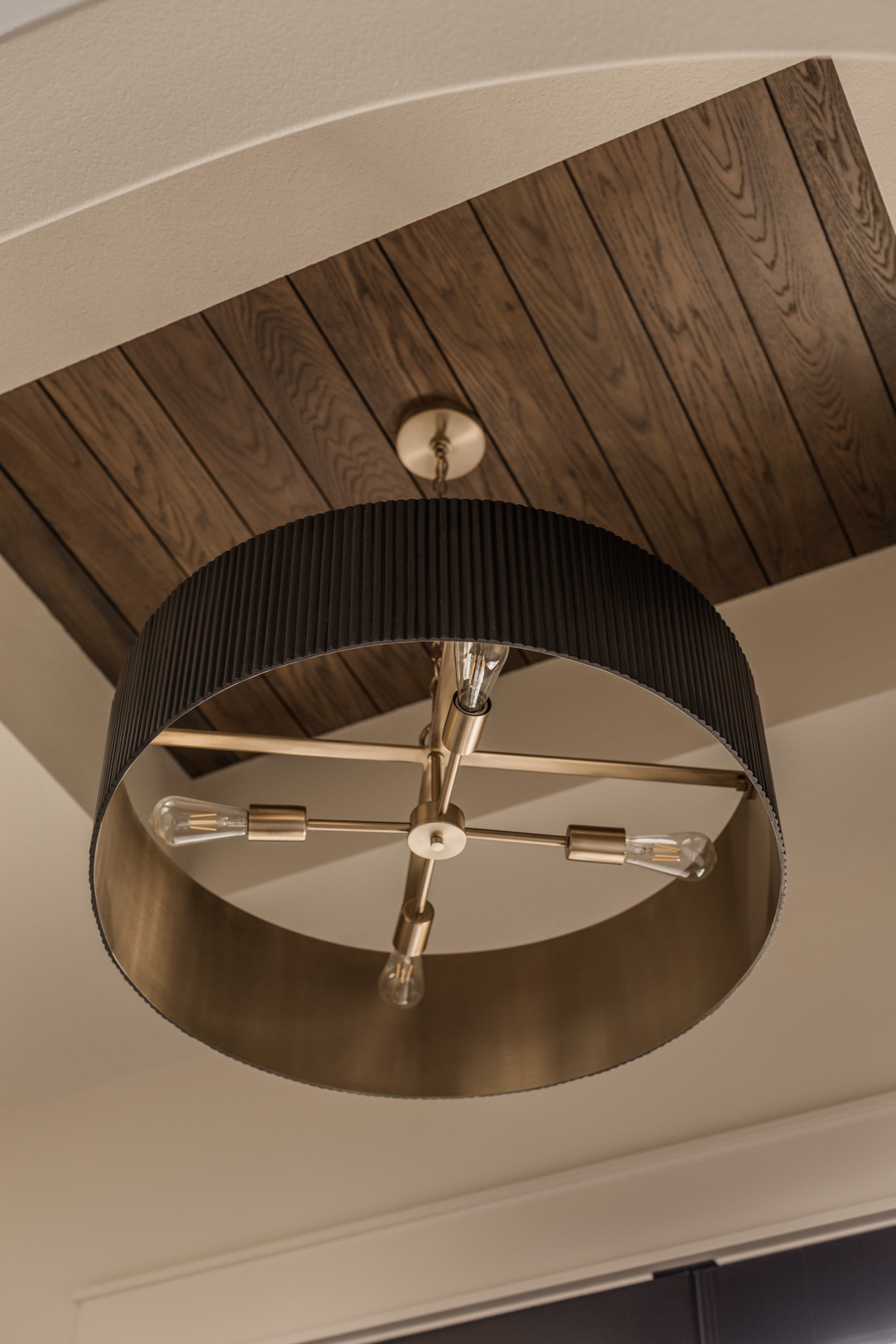 The reeded wood on this chandelier! 

#LTKHome #LTKStyleTip #LTKSaleAlert