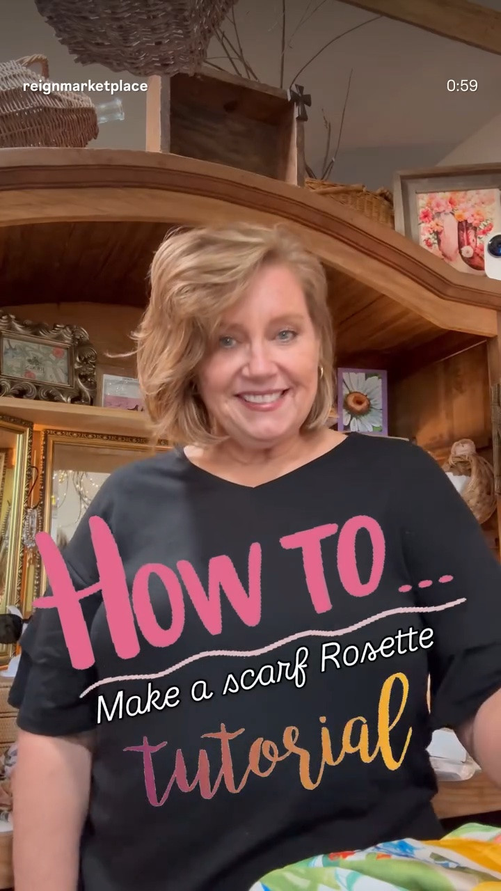 How to Create a Rosette Bandana Necklace
1. Fold your square scarf in half diagonally to create a triangle.
2. Tie the two far corners of the longest edge together with a small knot.
3. Slip that knotted section over your wrist to hold it in place while you work.
4. Gather the two loose ends and twist them around each other twice, ending with rabbit ears.
5. Take the end (ear) closest to the small knot and pull it through the center opening, just like threading a needle.
6. Gently pull both ends of the scarf to tighten and shape the rosette.
7. Adjust the folds until the flower looks full and balanced.
8. Tie the scarf around your neck and fluff the rosette for the perfect finishing touch.
Voilà! A chic rosette scarf necklace in less than a minute.

LIKE•SAVE•SHARE

#LTKootd #LTKvlog #LTKgrwm