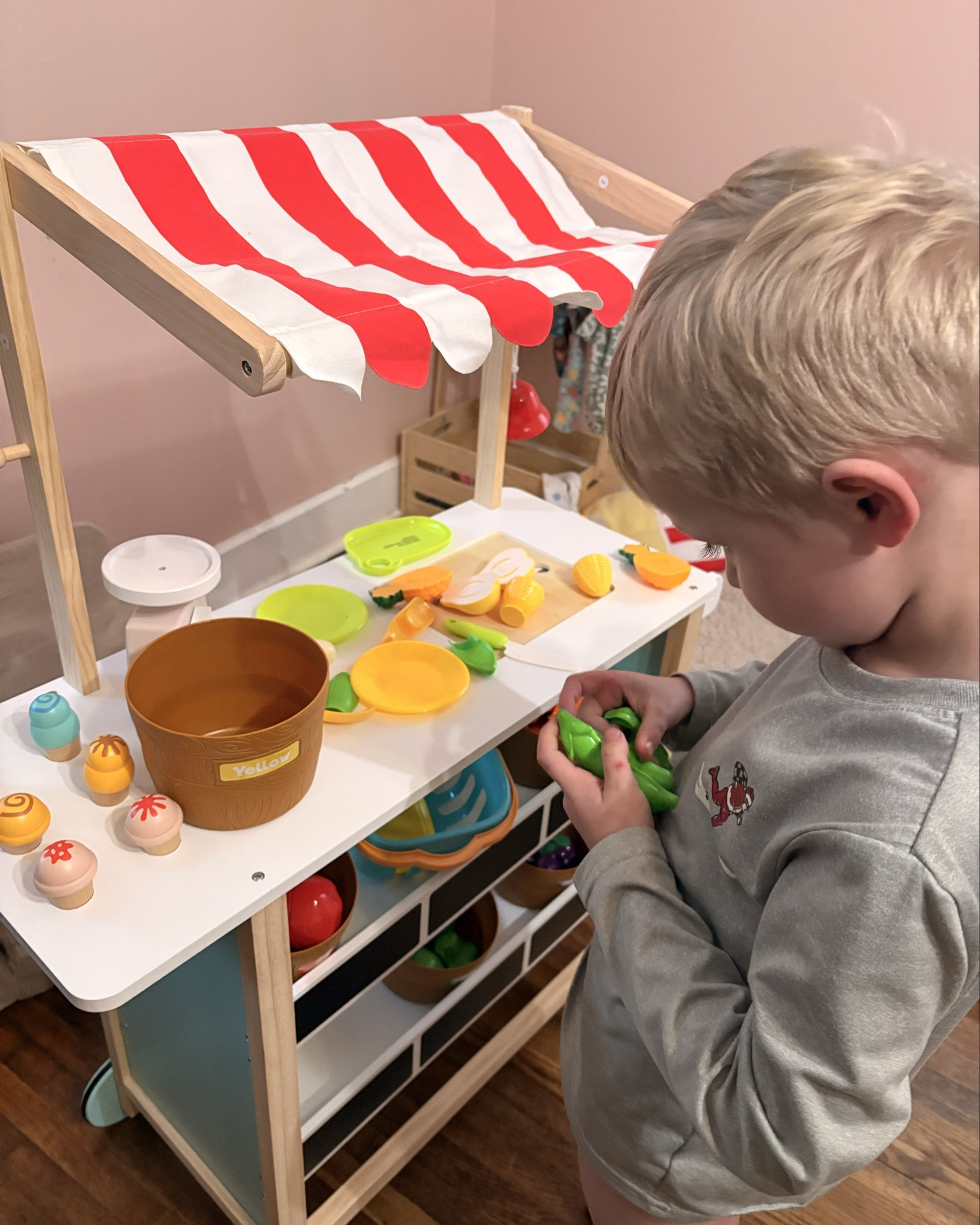 This ice cream cart comes with a spacious countertop for ice making and two shelves with chalkboards to display all kinds of food toys. Kids can write or draw on the chalkboards to present their shops daily specials. Adorable stripe canopy adds more realistic pretend play experiences for kids. Let’s kids pretend to own an ice cream stand or be a market customer!

#LTKmomlife #LTKKids #LTKHome