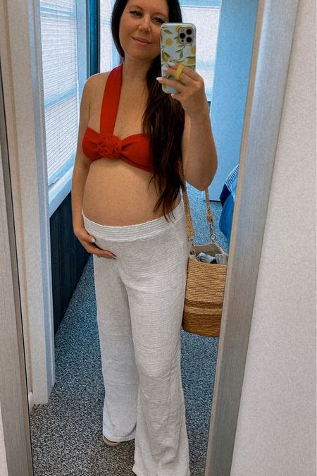 Beach outfit, vacation outfit, bump friendly maternity outfit

Beach pants, red rosette sweater crop top

Wearing size L in top, could have sized down to medium 

#LTKbump #LTKSeasonal #LTKstyletip