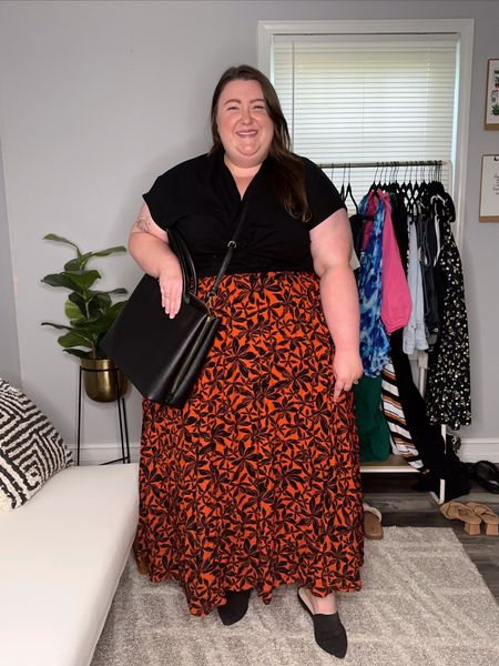 Plus Size Teacher Outfits! Caroline is wearing a printed maxi skirt in a size 4X (it runs a little generous), a front-twist top in a size 4X, and a tote bag all from Target! Shoes are from Amazon! 

#LTKcurves #LTKBacktoSchool #LTKSeasonal