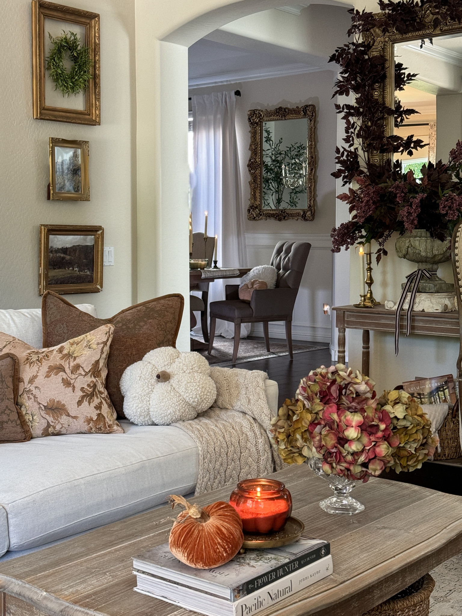 Pumpkin pillows, embroidered pillows, plum stems and candles for a cozy Fall living room. 

#falldecor 

#LTKHome #LTKSeasonal