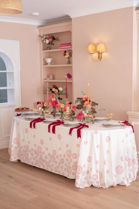 An autumn tablescape with berry red, coral orange and amber yellow colours, perfect for an elegant Thanksgiving or Halloween dinner party (just add pumpkins!). The tablecloth is available on my website and designed by me with a dahlia flower design 🤍

#LTKhome #LTKeurope