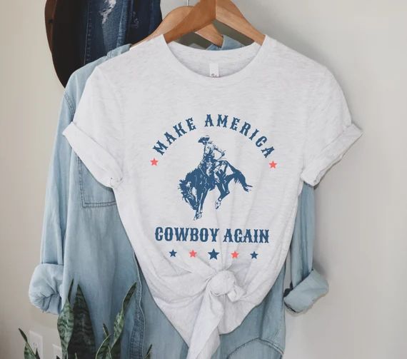 Make America Cowboy Again shirt | Western graphic tee | Patriotic rodeo shirt | Rodeo gift | Amer... | Etsy (US)