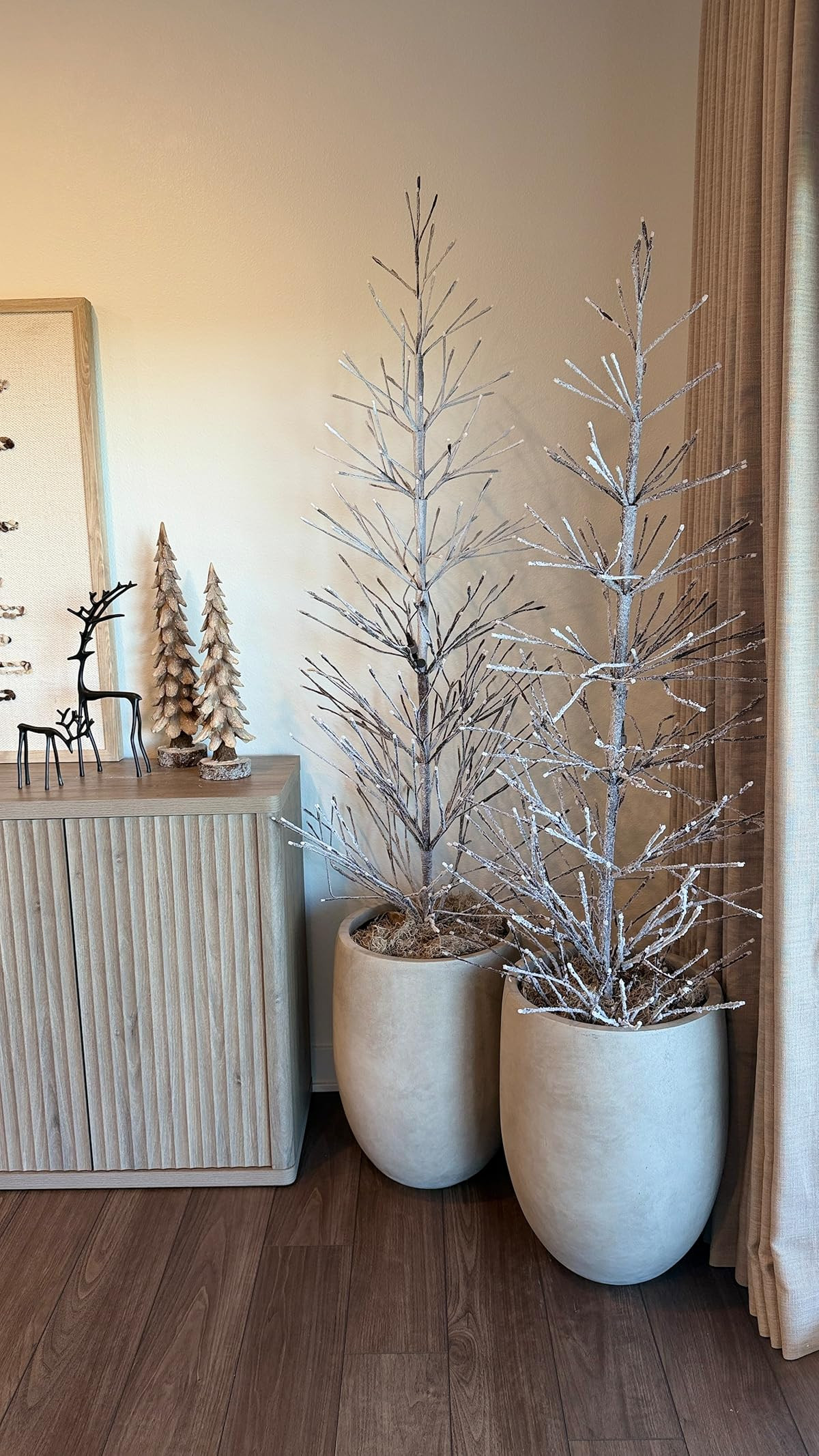 These twinkle trees are absolutely stunning — the perfect cozy sparkle for any corner of your home ✨🎄 The wooden little trees and black reindeer on my cabinet are the perfect touches for this corner!  

 

#LTKHoliday #LTKSeasonal #LTKHome