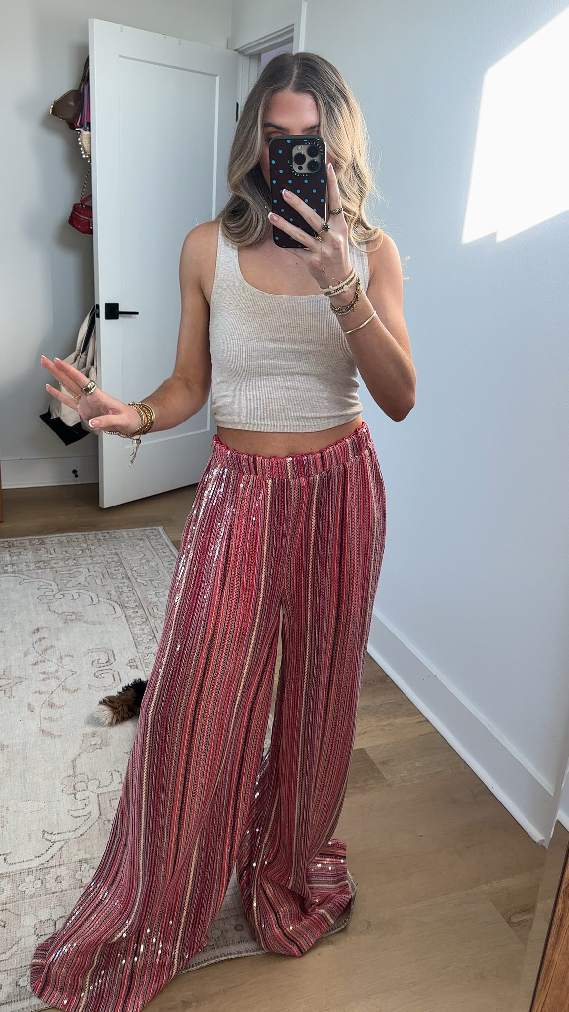 @AKIRA size s/m. Rock sultry sequins at the beach! The AKIRA Label Taylor Sequin Pants features a shimmering, knit, vertical stripe pattern in pink, purple, and orange with sequin accents. The elastic waistband on the pants provides comfort and ease of movement with a flattering high-waisted, flare leg design. Pair with the Taylor Sequin Bralette and the Taylor Sequin Front Tie Duster for a complete look.

#LTKootd #LTKSeasonal #LTKgrwm