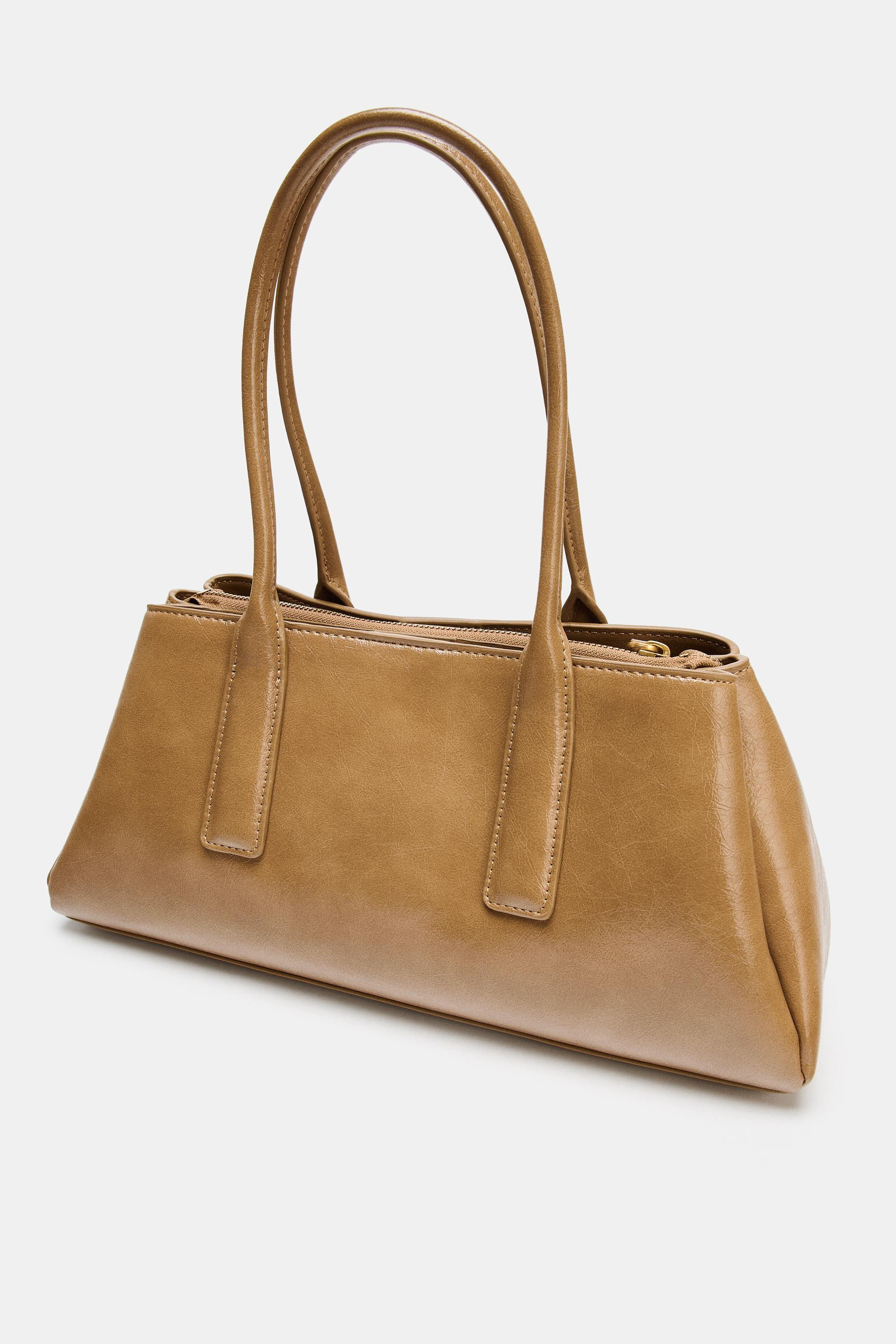 CRACKLED-EFFECT CITY BAG35.99 GBPBeige | 6348/510/716Put it in your basketAddOblong crackled-effe... | Zara UK