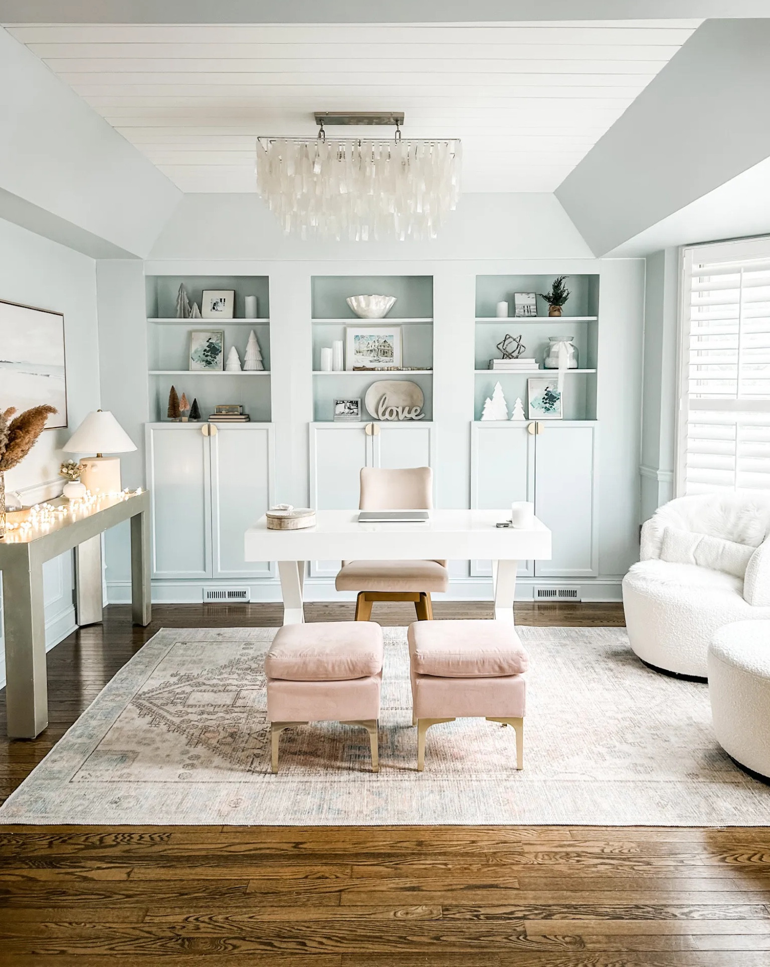 Coastal home office, blush area rug, capiz chandelier, coastal chandelier, shell chandelier, wall art, framed canvas wall art, landscape wall art, neutral wall art, shelf decor, white x-crossed legs desk with drawer, neutral decor. Upholstered blush velvet ottoman, Swivel chair, swivel barrel chairs, Bouclé swivel accent chair, white swivel accent chairs, Target. West Elm. Wayfair. Wayfair Sale, The Big Furniture Sale, Chairs. #LTKSale

#LTKFind #LTKSale #LTKhome