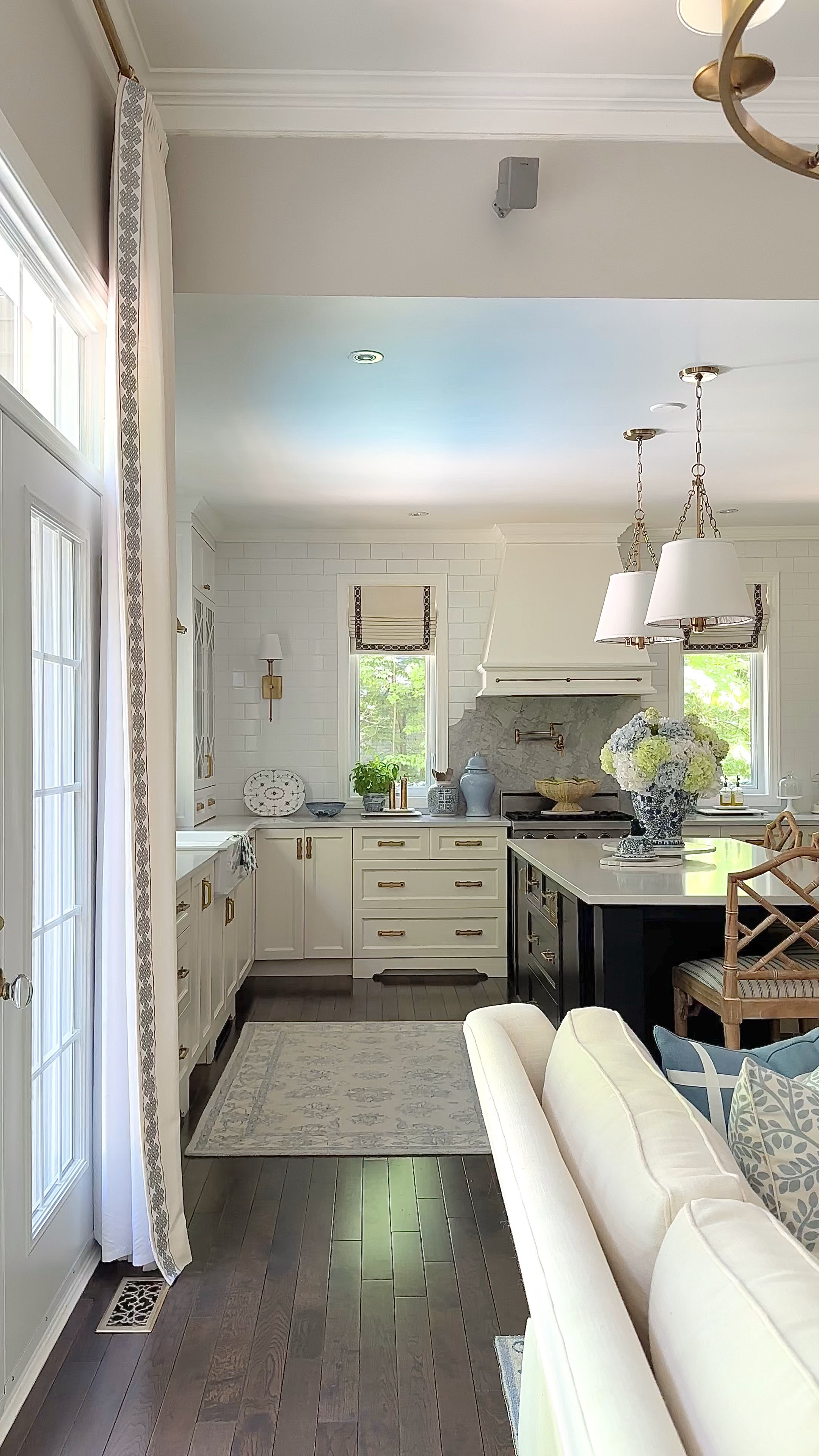 Summer decor in gorgeous blue and white with touches of soft green! Add stunning oversized floral arrangements to make a HUGE statement! Our pillow covers and blue lamps are all 20% off right now!!! Our living room rug is 15% off and a best seller!

#LTKStyleTip #LTKHome #LTKSeasonal