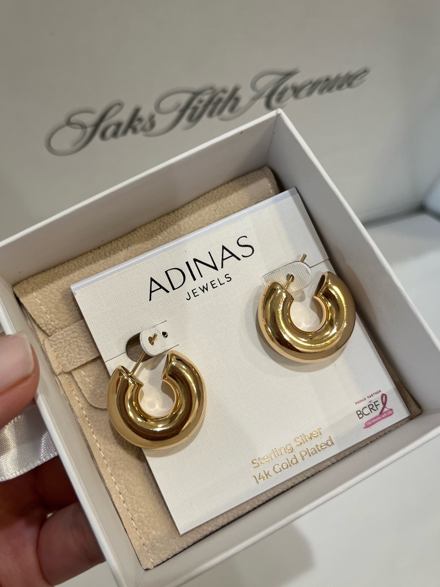 Adinas jewels on sale at Saks! Cute gold hoops on sale. 

#LTKsalealert