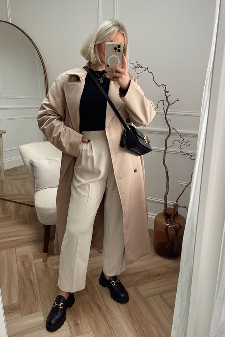 Trench coat styling with black & cream pieces. Cream tailored trousers (similar linked), black knit jumper from mango, trench coat, black Gucci vibes loafers from mango and coach crossbody bag

#LTKshoecrush #LTKstyletip #LTKitbag