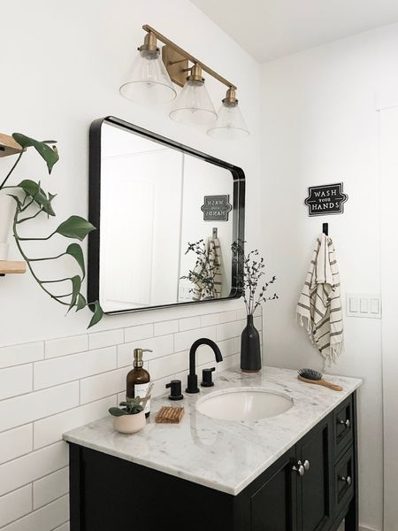 One of my all time favorite mirrors is now 50% off!  The metal ledge gives it a modern, yet classic vibe. Works with a variety of decor styles and really elevated this bathroom remodel! 



#LTKsalealert #LTKCyberWeek #LTKhome