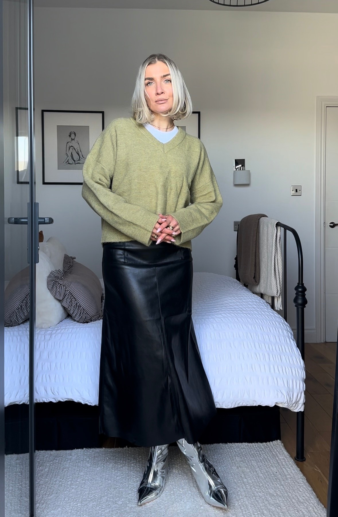 Faux leather midi skirt 
Olive green v neck jumper 
Second skin white top 
Winter workwear 

#LTKstyletip #LTKworkwear #LTKuk