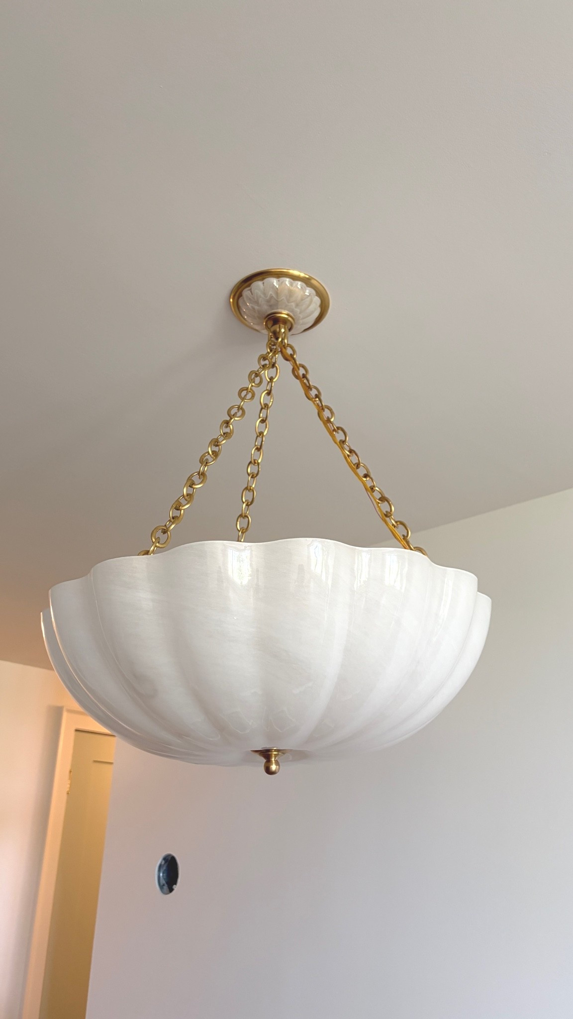 The prettiest pendant light in gold and glass

#LTKhome