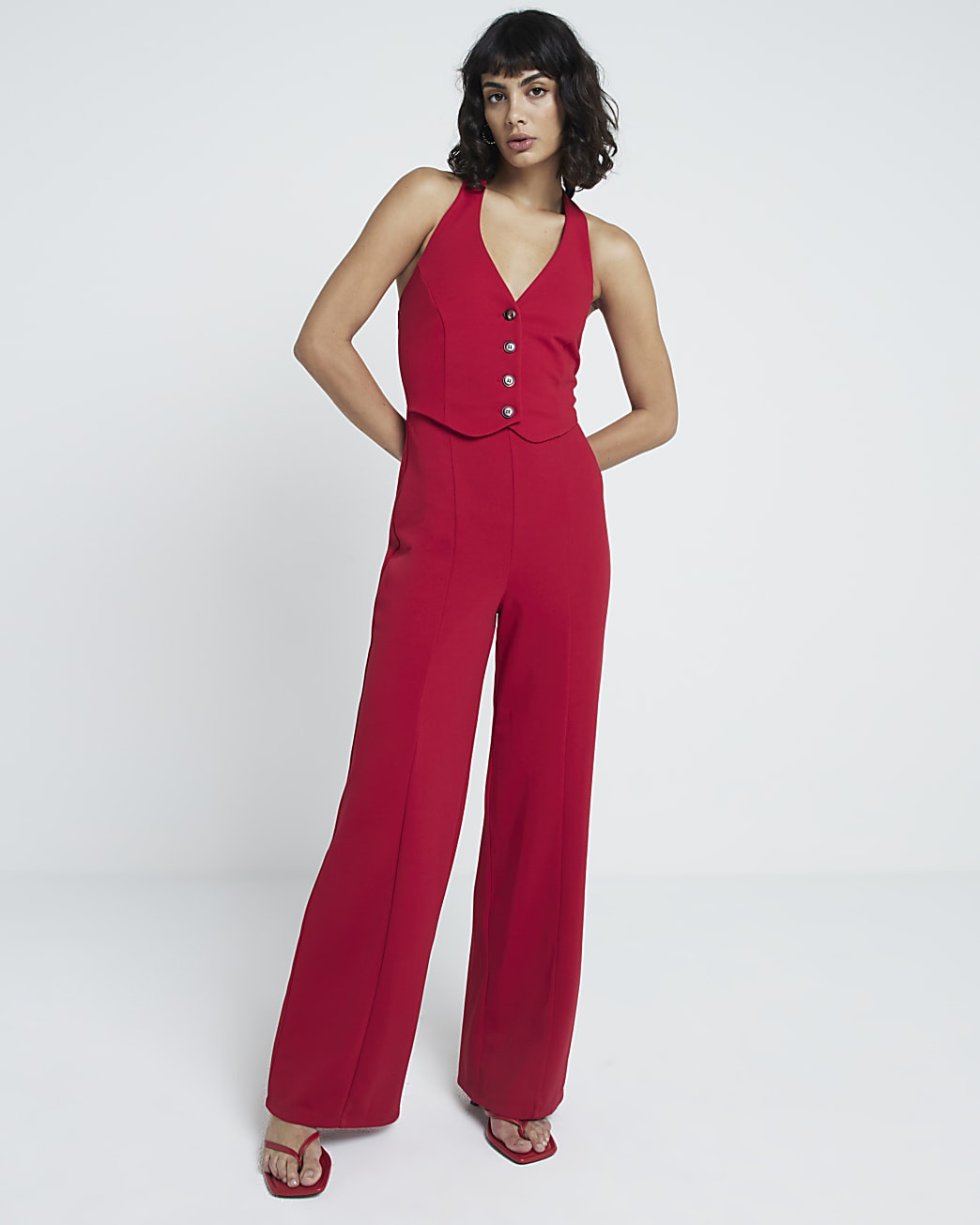 Red halter neck waistcoat jumpsuit | River Island UK & IE