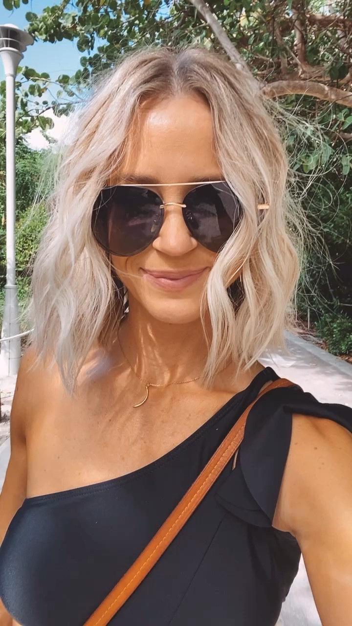 The cutest one shoulder ruffle swim suit top. Perfect for the pool or the boardwalk 🕶️ Not to mention my favorite Lenox DIFF sunnies. 

#LTKstyletip #LTKtravel #LTKswim