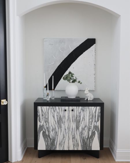 Simple Easter decor! 

Marble cabinet, artwork, vase, home decor 

#LTKhome #LTKU #LTKstyletip