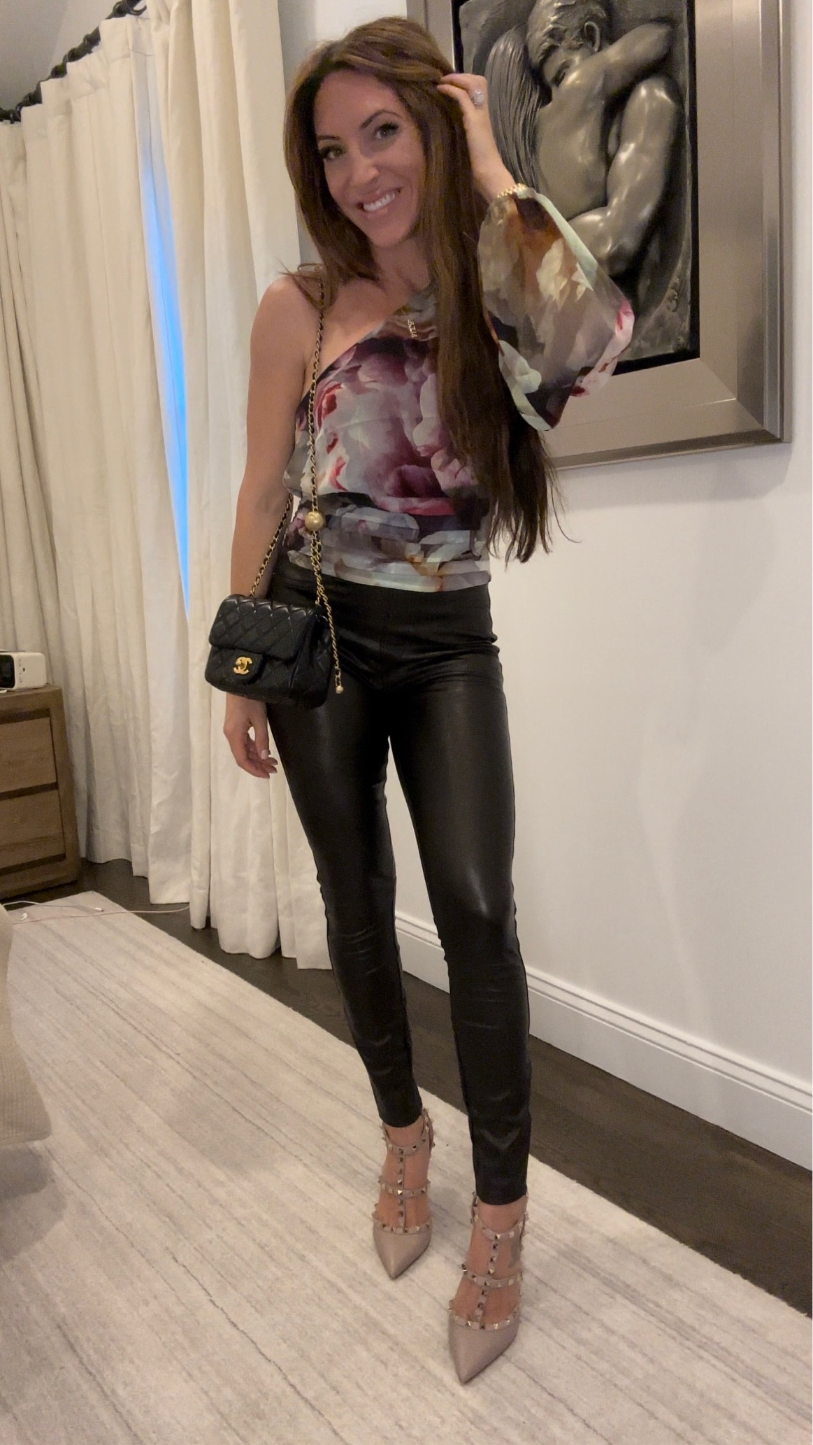 Here’s a cute date night outfit. These vegan leather pants are EVERYTHING! They look so chic, yet are so stretchy and comfortable. And they’re spanx, so you know they’re going to hold you in just right 😂 

Asymmetric one-shoulder floral blouse | pleather pants | Valentino rock studs | Chanel pearl crush 

#LTKsalealert #LTKstyletip #LTKshoecrush