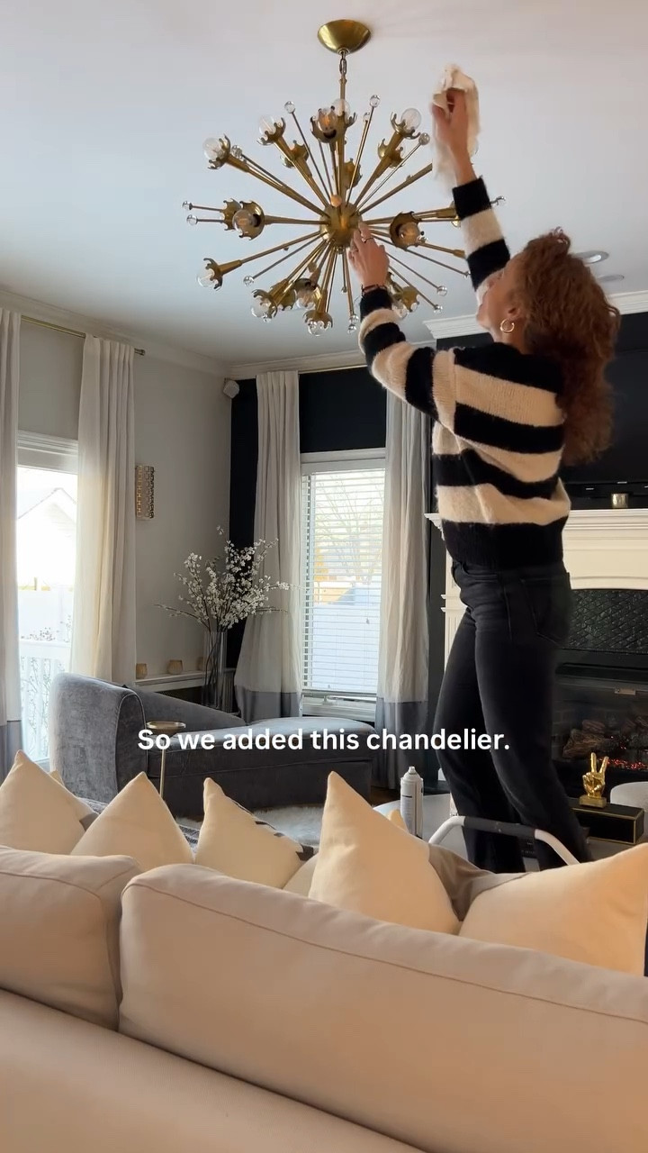 Twenty years ago, this living room had a ceiling fan in the center.

For the makeover, we wanted something more dramatic, so we added this chandelier—and it completely changed the room.

The only regret?
I probably didn’t need all those can lights to begin with.

Sometimes less really is more.

Comment SHOP below to receive a DM with the link to this post on my LTK https://liketk.it/5SJof

#livingroomdesign #beforeandafter #lightingdesign #interiordesigntips #homerenovation