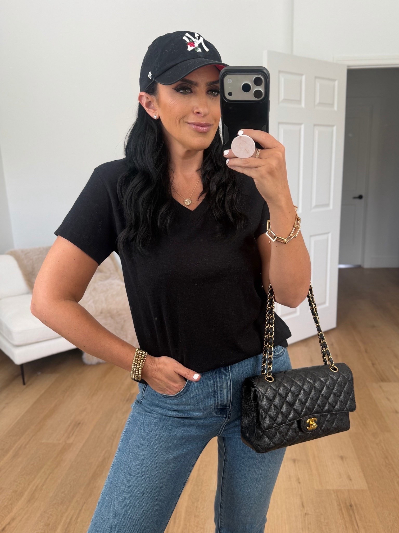 Quince 100% Organic Cotton Slub V-Neck Tee wearing size medium only $19. Quince Bella Stretch Straight Jeans wearing size 27 only $50. 
