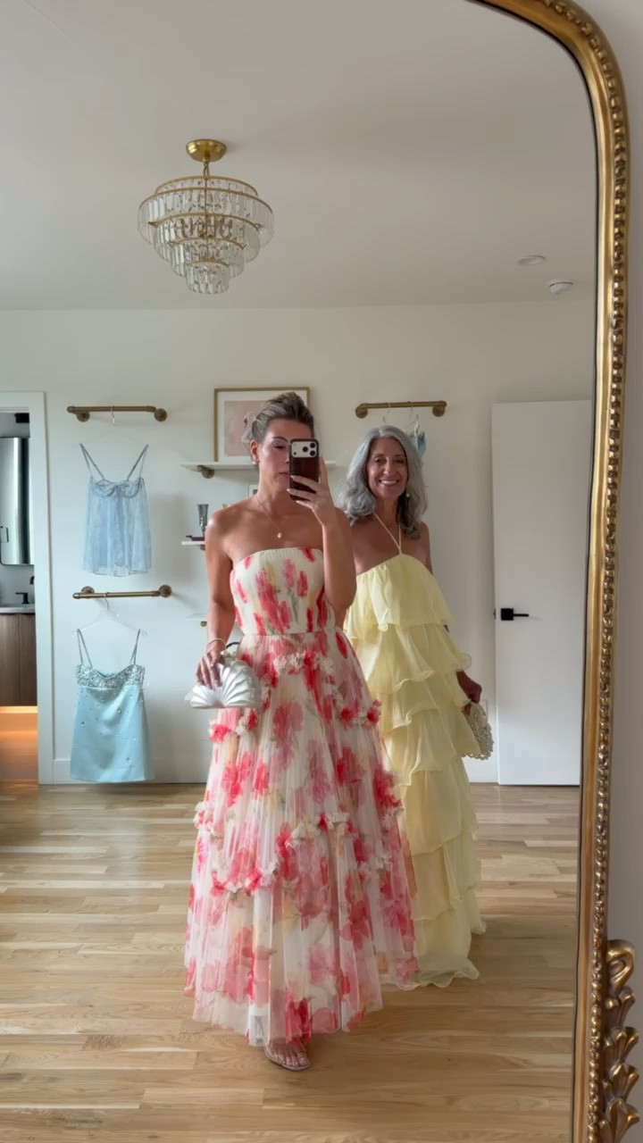 🌺 the garden wedding moment that lives in photos forever.

A pink and red watercolor floral strapless ballgown with a full pleated skirt that sweeps and moves with dramatic romantic joy. 

A soft butter yellow tiered ruffle halter maxi that flows and cascades beautifully with every step.

I wear a medium or 6. Emerson wears her usual small or 2.

Save this for your next invitation.

Share it with a friend who's shopping. 💌

#weddingguestdress #motherofthebride #gardenwedding #springwedding #weddingseason2026

#LTKSeasonal #LTKOver40 #LTKWedding