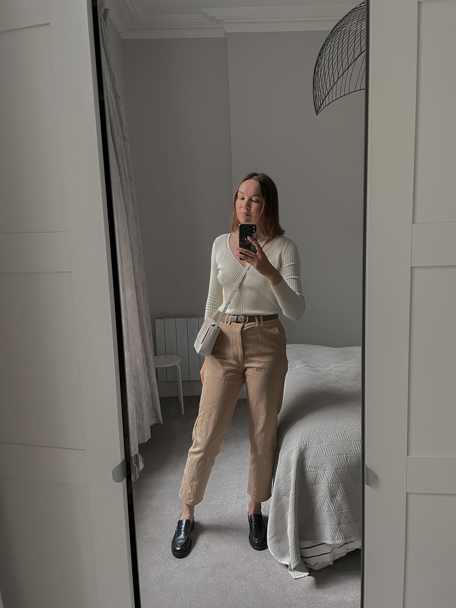 Office outfit |

Minimal style, simple outfit, neutral colors, COS off white top, COS beige chinos, Autelier Auguste off white box bag, Dear Frances loafers

#LTKSeasonal #LTKstyletip #LTKworkwear