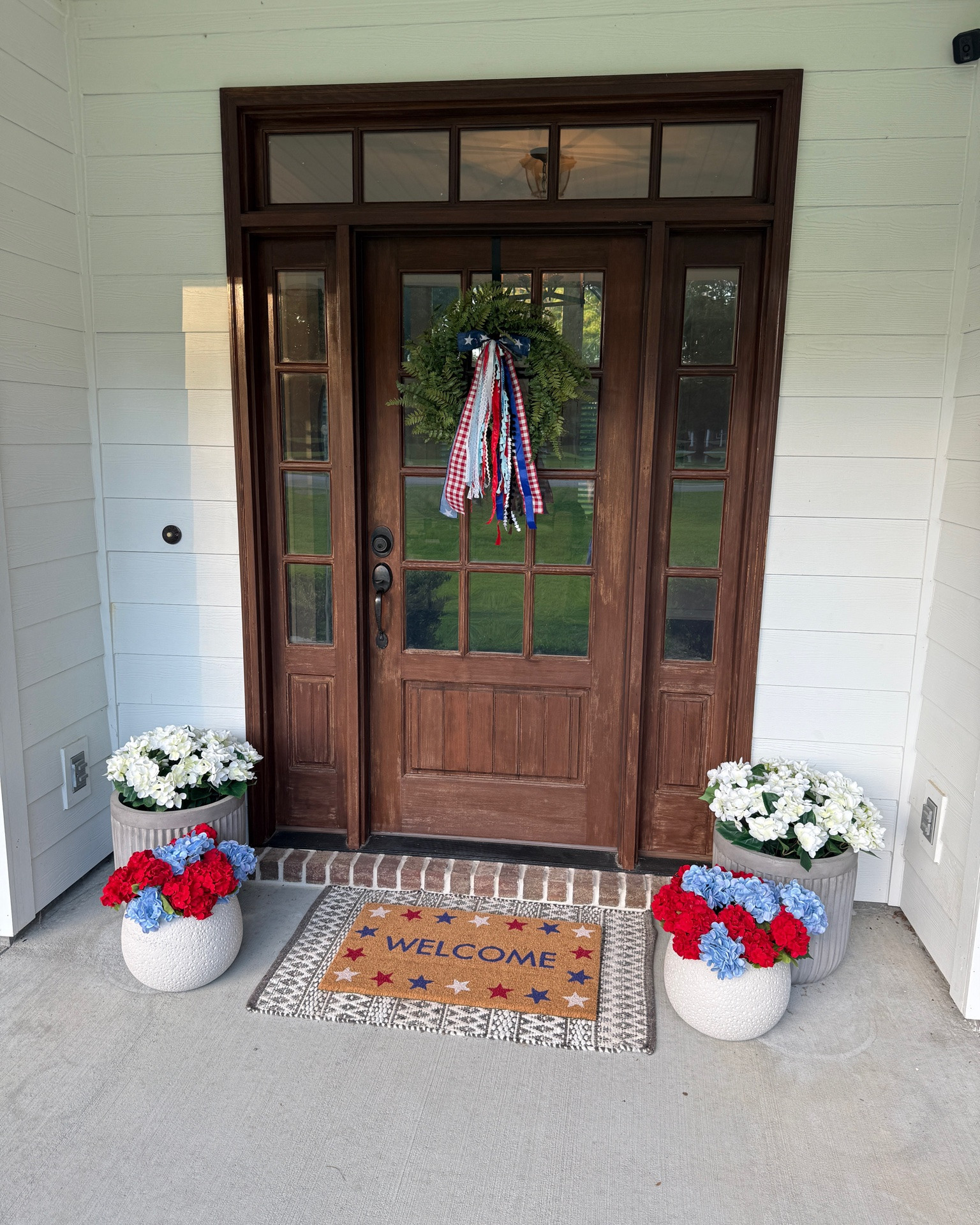 Summer porch decorated for 4th of July / Memorial Day

#LTKHome