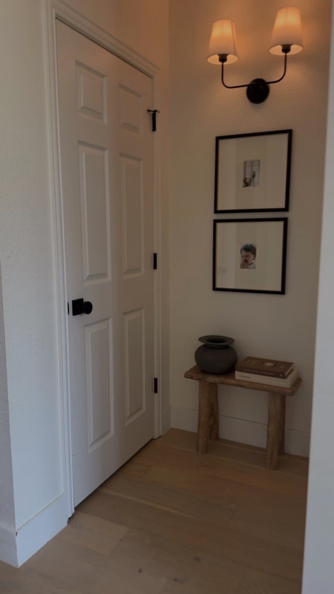 Love these faux linen coffee table books for affordable decor! Linking my wooden stool, matted frames, vase and light from this hallway too 🤎

#LTKHome