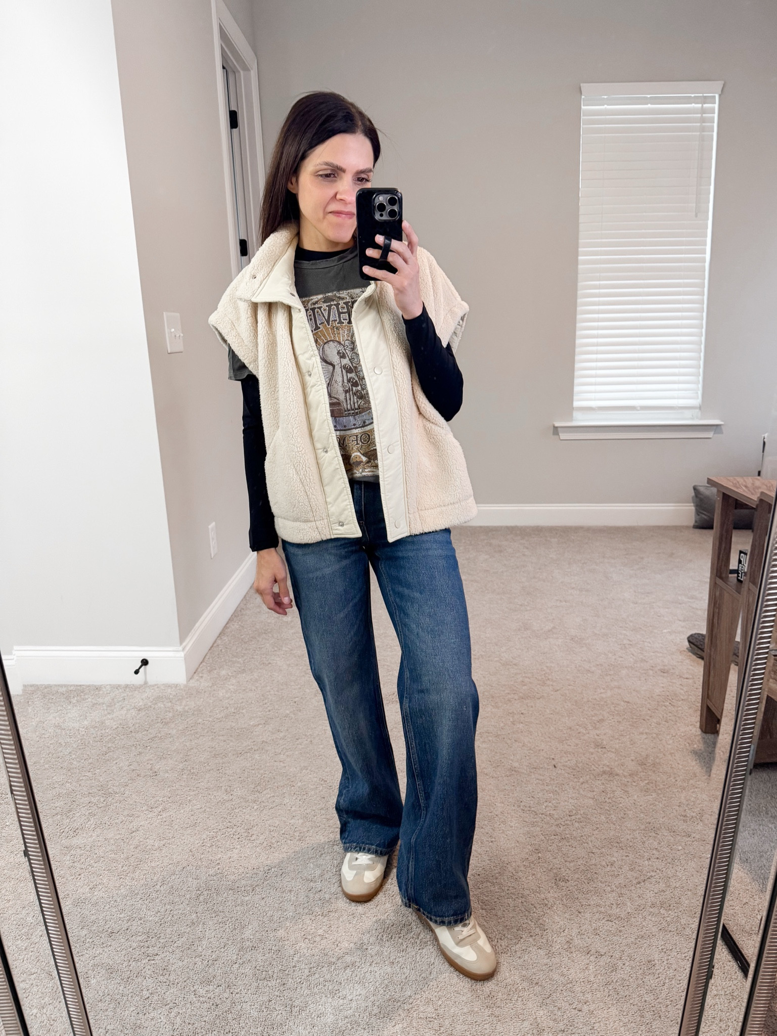 Winter outfit inspo - graphic tee, fleece vest, wide leg jean 


#LTKStyleTip