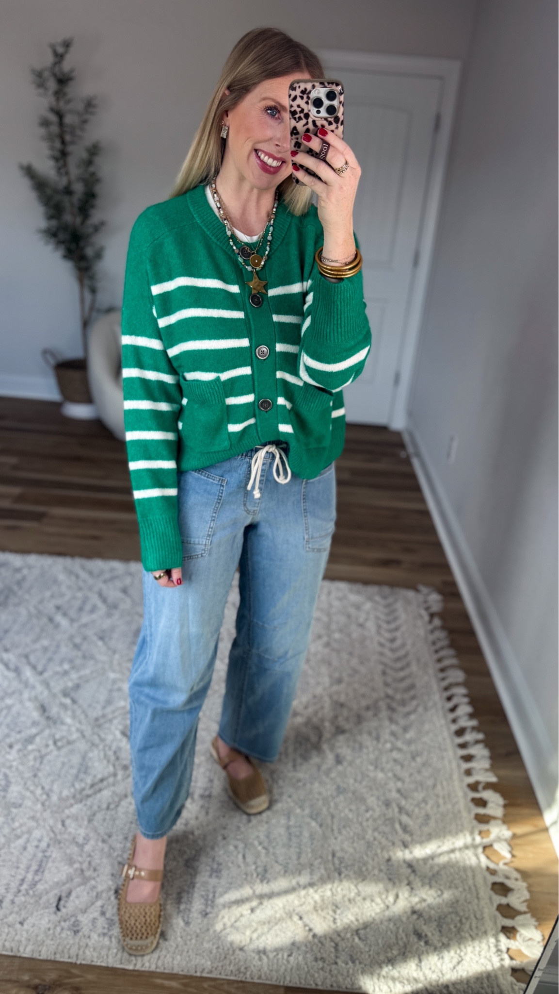Green striped cardigan and pull on jeans 

#LTKSaleAlert #LTKootd