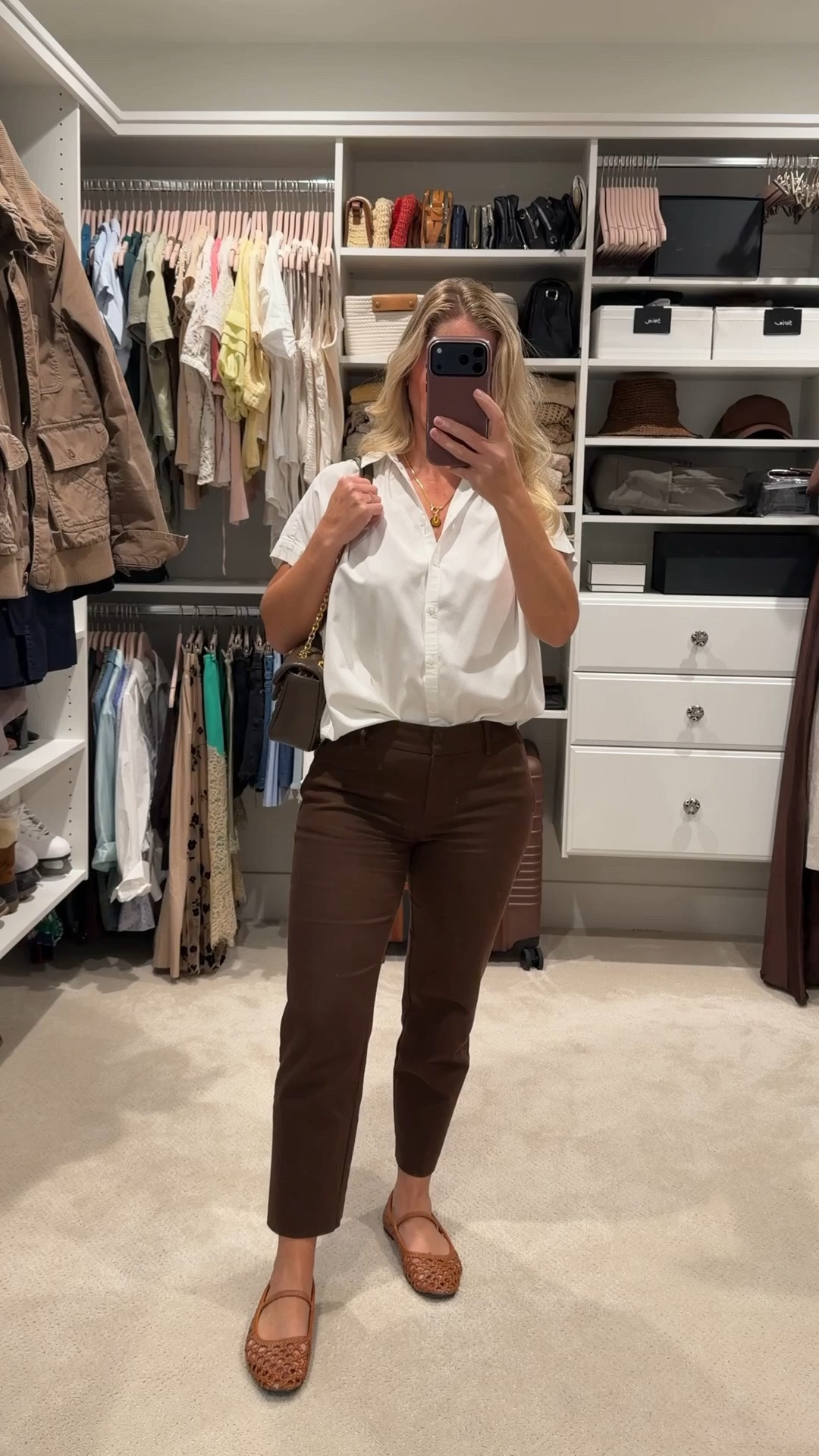 One of my favorite outfit formulas: white + chocolate brown. 🤎

A crisp white button-down instantly brightens the look, while chocolate brown adds warmth and feels a little softer than black. It’s polished enough for work, comfortable enough for everyday, and timeless enough that I’ll be wearing this combination for years.

I’m finding that the more I edit my wardrobe, the more I reach for outfits built around versatile basics instead of trendy pieces. Fewer clothes, more combinations.

Everything is linked in my LTK, including these petite-friendly trousers, woven flats, my everyday bag, and layered gold jewelry.

#LTKStyle #BusinessCasual #PetiteStyle #ClassicStyle #CapsuleWardrobe #WorkwearOutfit #ChocolateBrown #NeutralStyle #WardrobeEssentials #OfficeStyle #Over40Style #LTKFinds

#LTKootd #LTKWorkwear #LTKPetite