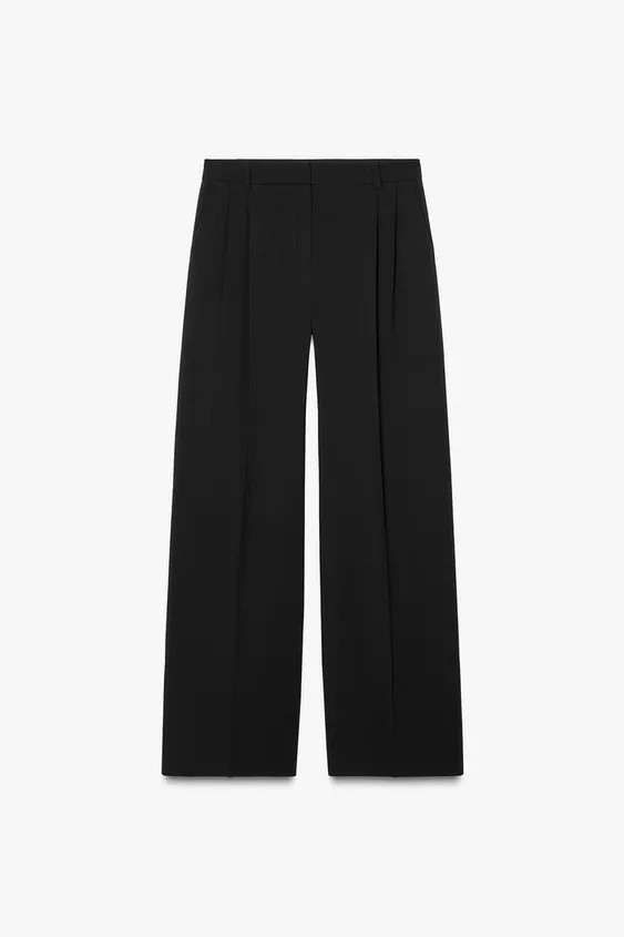 High-waist trousers with front darts. Front pockets. Wide-leg design. Front zip fly, inside butto... | Zara UK